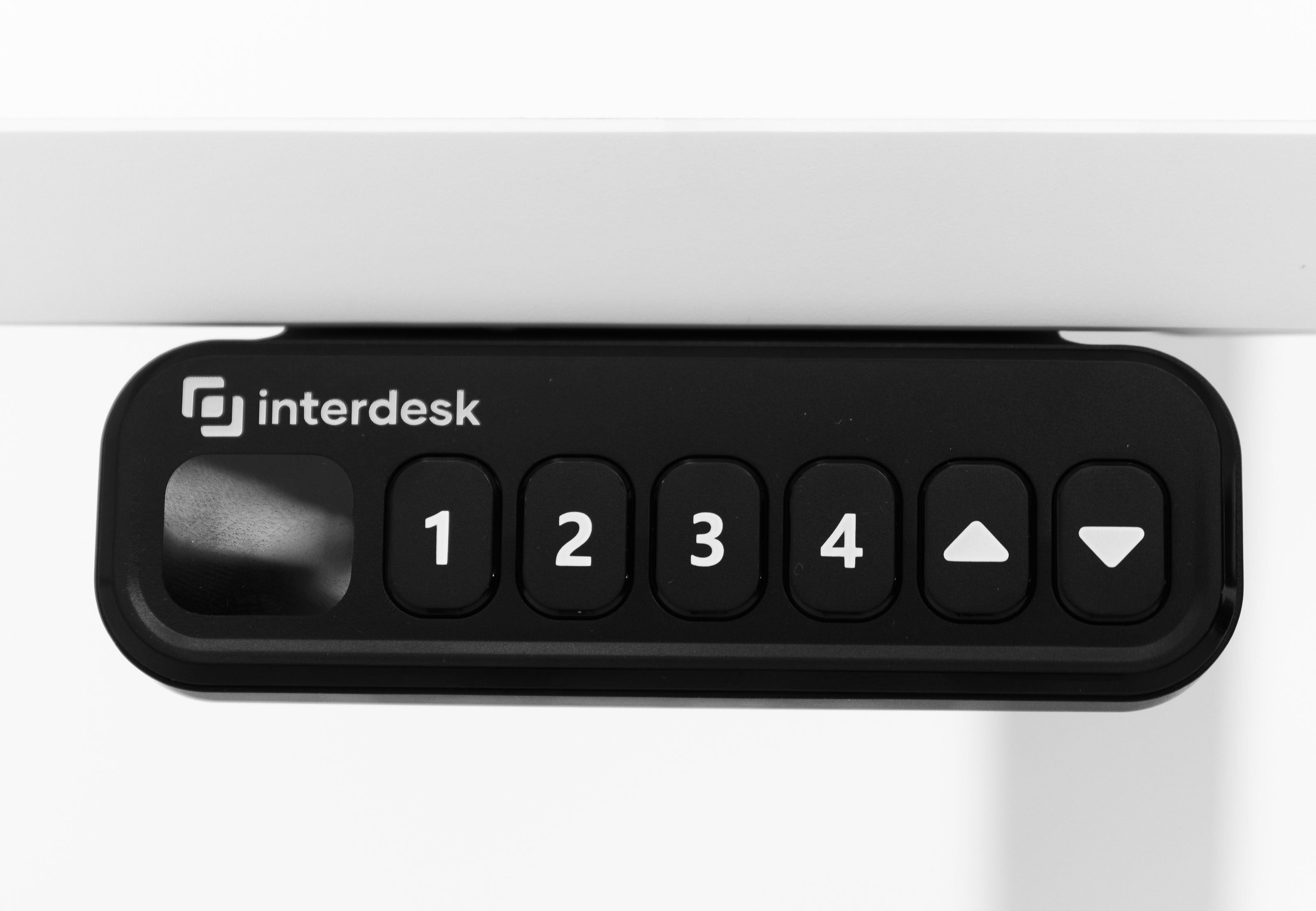 interdesk black controller white table